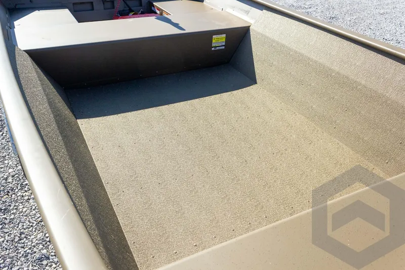 Slide: The Image of 2026 G3 Gator Tough 1548 VBW boat interior with textured flooring. - 25