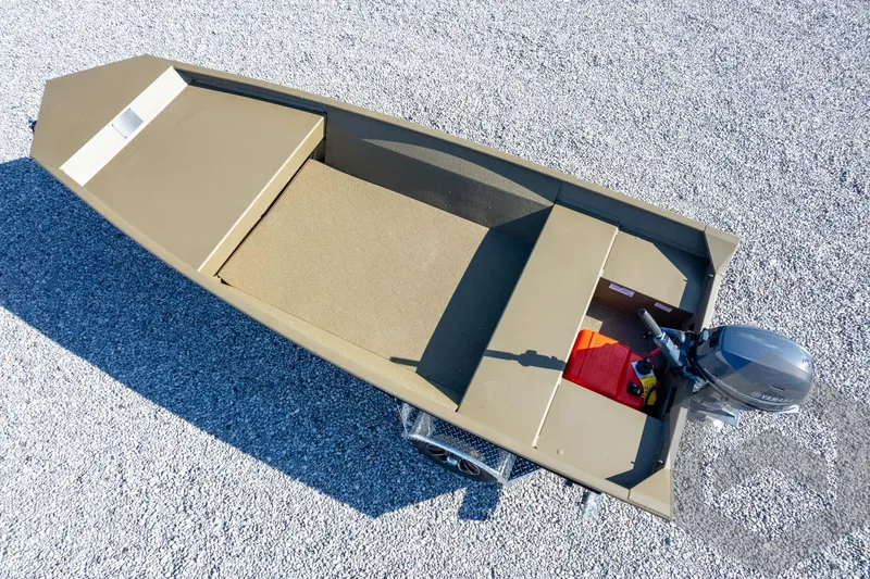 Slide: The Image of 2026 G3 Gator Tough 1548 VBW boat on gravel, featuring a Yamaha outboard motor. - 40