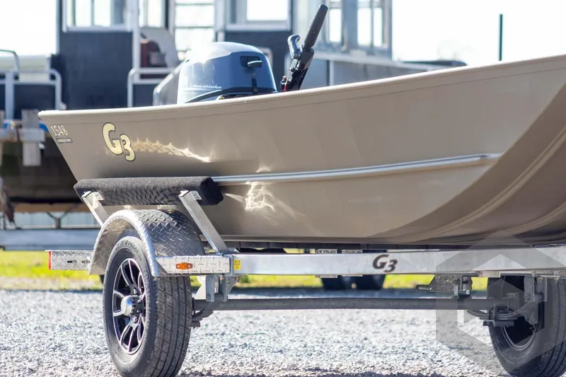 Slide: The Image of 2026 G3 Gator Tough 1548 VBW boat on trailer, side view. - 5