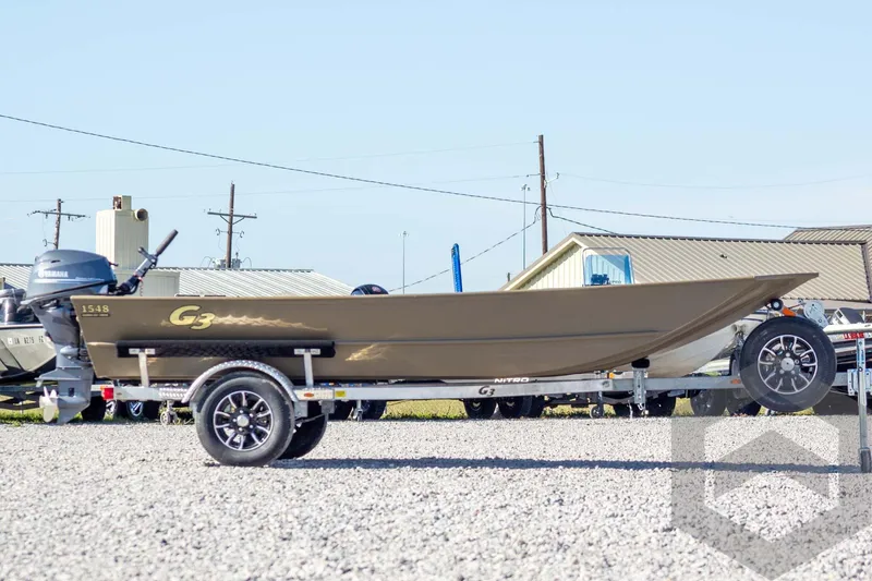 Slide: The Image of 2026 G3 Gator Tough 1548 VBW boat on trailer, outdoor display. - 6