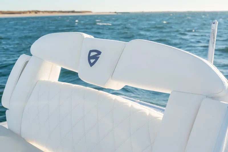 Slide: The Image of White leather seat on 2020 BARKER 26 boat with ocean view. - 29