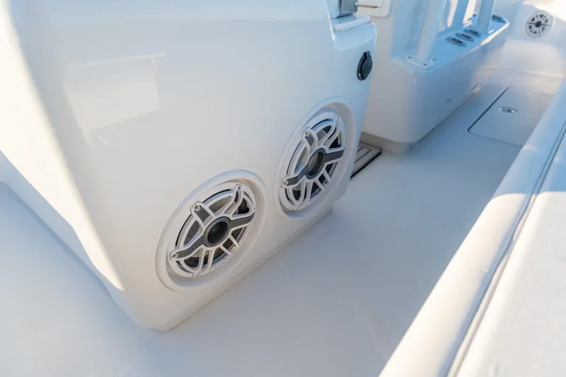 Slide: The Image of Close-up of speakers on a 2020 BARKER 26 boat interior. - 35