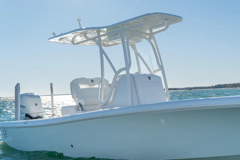 Slide: The Image of 2020 BARKER 26 boat on water, featuring sleek design and powerful engine. - 1