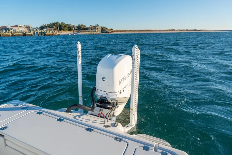 Slide: The Image of BARKER 26 boat with Mercury engine on open water, 2020 model. - 31