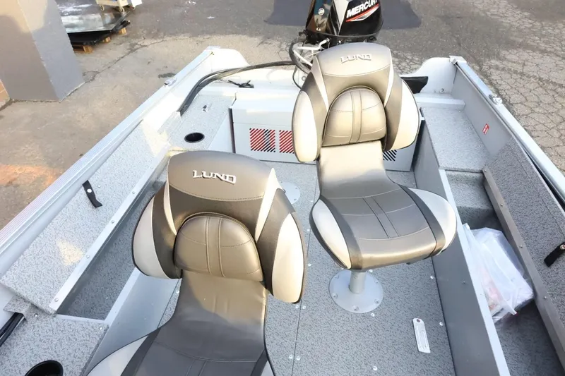 Slide: The Image of 2026 Lund 1600 Fury SS boat interior with two cushioned seats. - 26