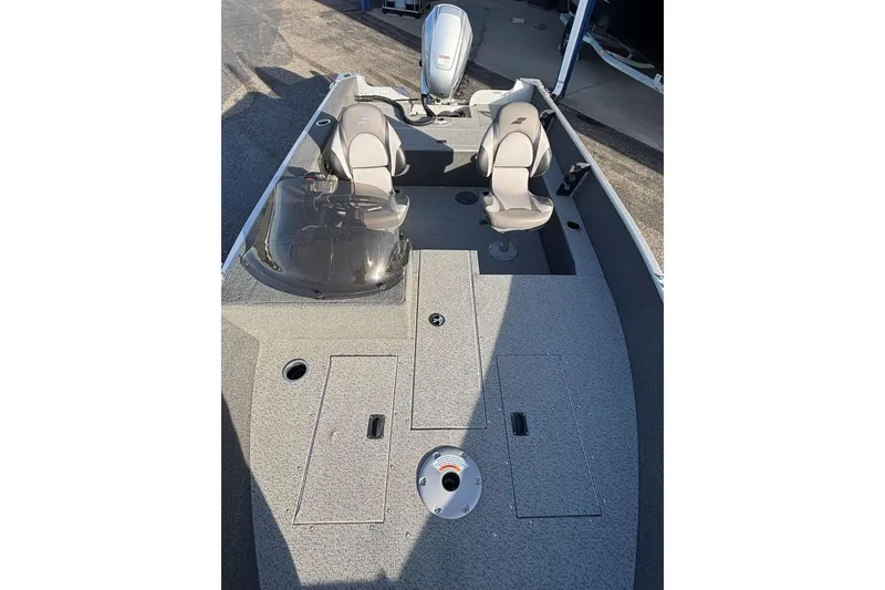 Slide: The Image of 2024 Starweld Fusion Pro 16 SC boat interior with seating and storage compartments. - 12