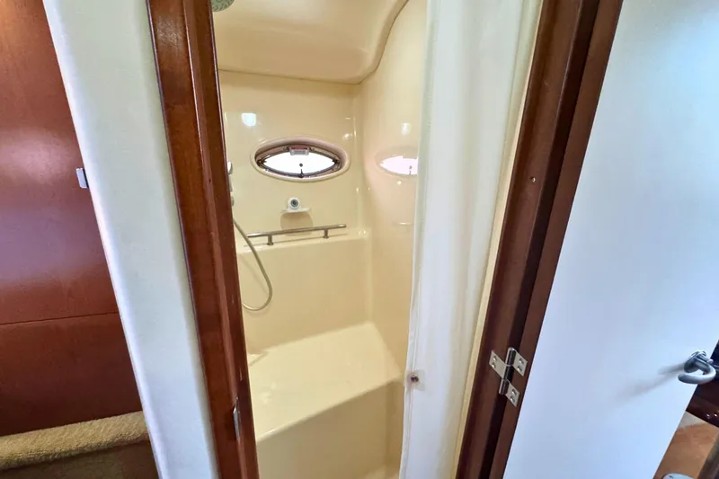 Slide: The Image of Interior shower of 2008 Sea Ray 38 Sundancer yacht with porthole window. - 47