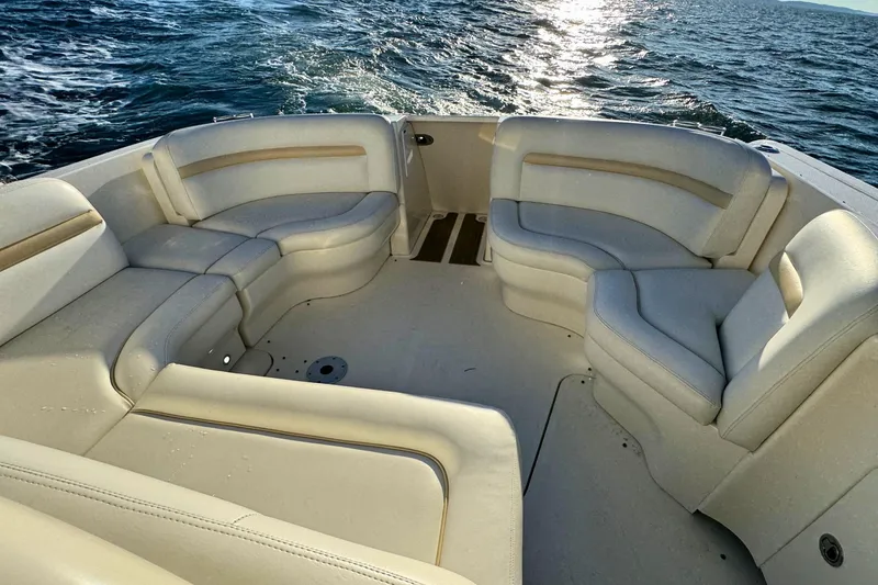 Slide: The Image of Luxurious seating on 2008 Sea Ray 38 Sundancer yacht, ocean view in background. - 50