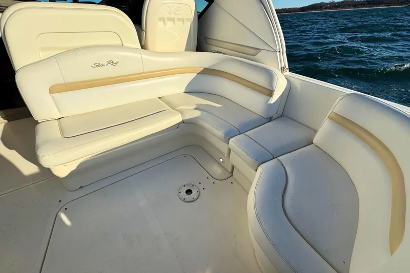 Slide: The Image of Luxurious seating on a 2008 Sea Ray 38 Sundancer yacht, overlooking the ocean. - 8