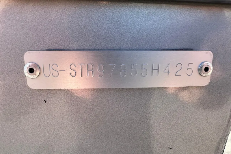 Slide: The Image of 2025 Starweld Fusion Pro 20 DC boat on trailer, parked outdoors under clear sky. - 10