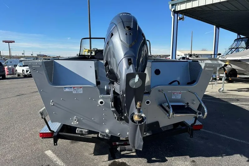 Slide: The Image of 2025 Starweld Fusion Pro 20 DC boat interior with seating and steering console. - 14