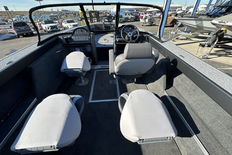 Slide: The Image of Interior of 2025 Starweld Fusion Pro 20 DC boat with seating and storage. - 16