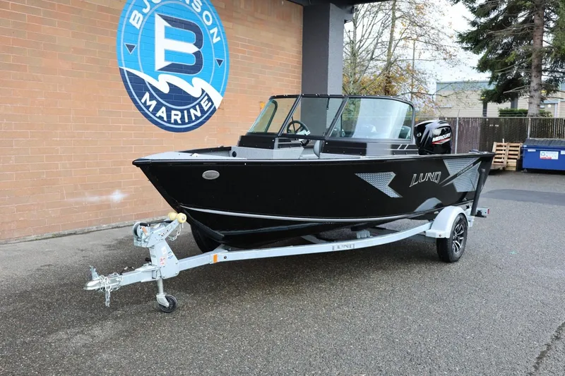 Slide: The Image of 2026 Lund 1775 Adventure Sport boat on trailer at dealership. - 13