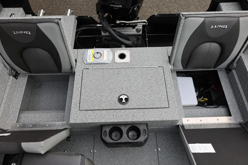 Slide: The Image of 2026 Lund 1775 Adventure Sport boat interior with seating and storage compartments. - 19