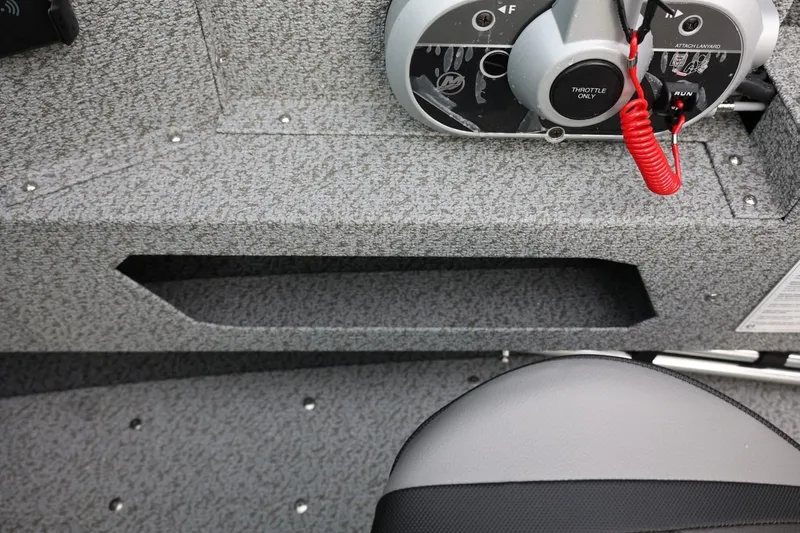 Slide: The Image of Control panel of 2026 Lund 1775 Adventure Sport boat with throttle and safety lanyard. - 28