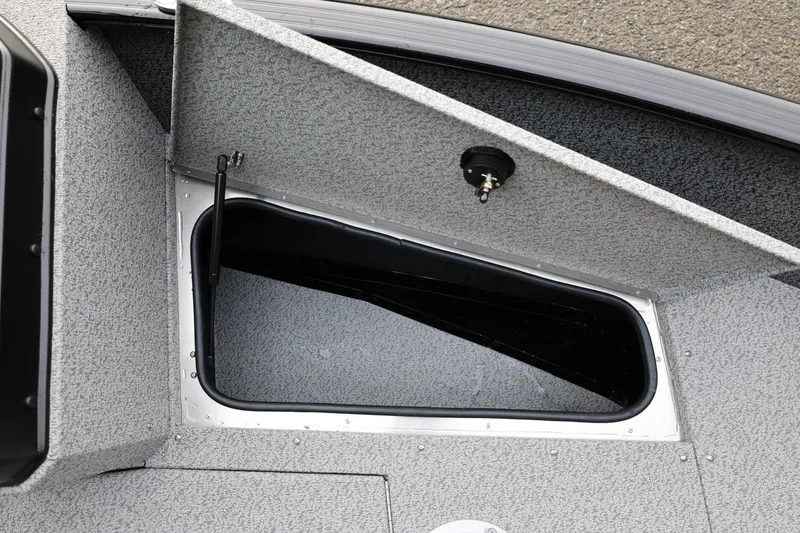 Slide: The Image of Open storage compartment on 2026 Lund 1775 Adventure Sport boat. - 39