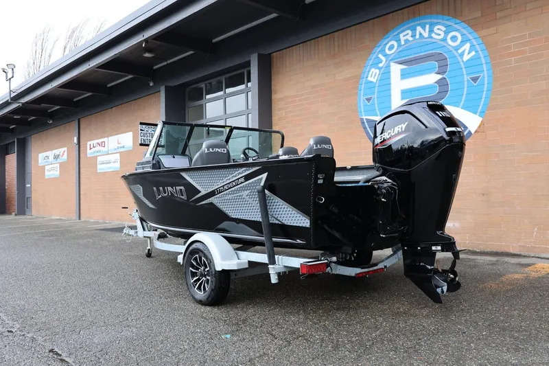 Slide: The Image of 2026 Lund 1775 Adventure Sport boat on trailer outside Bjornson building. - 4