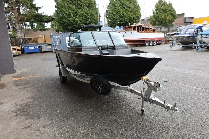 Slide: The Image of 2026 Lund 1775 Adventure Sport boat on trailer in outdoor lot. - 9