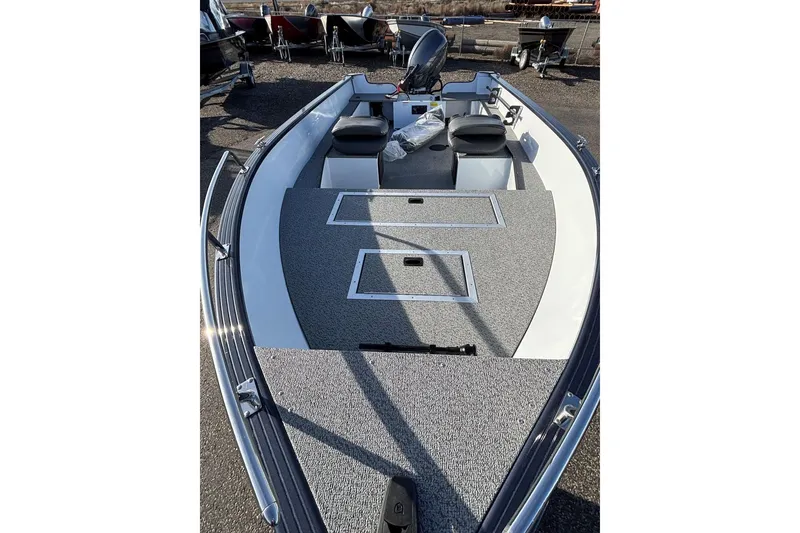 Slide: The Image of 2026 Smoker Craft Pro Lodge 160 boat with spacious deck and seating. - 4