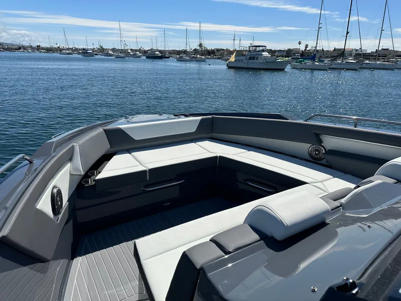 Slide: The Image of Luxurious interior of 2023 Cruisers Yachts 42 GLS on calm waters. - 13