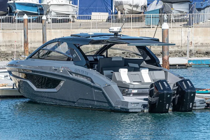 Slide: The Image of 2023 Cruisers Yachts 42 GLS in harbor, luxury motorboat. - 2