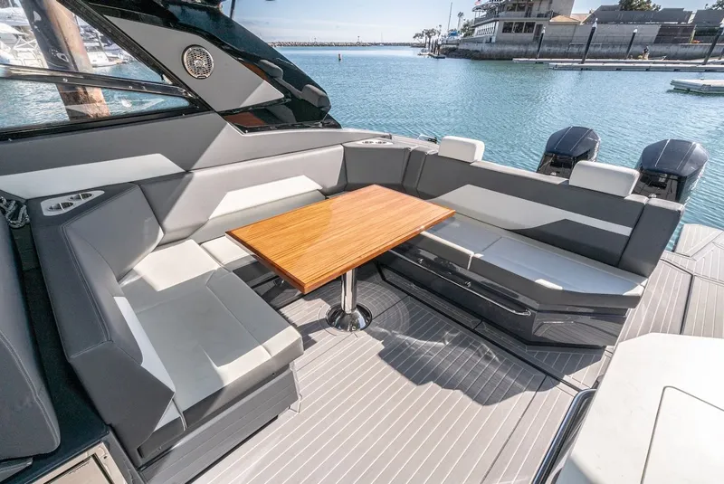 Slide: The Image of Interior of 2023 Cruisers Yachts 42 GLS with seating and table. - 23