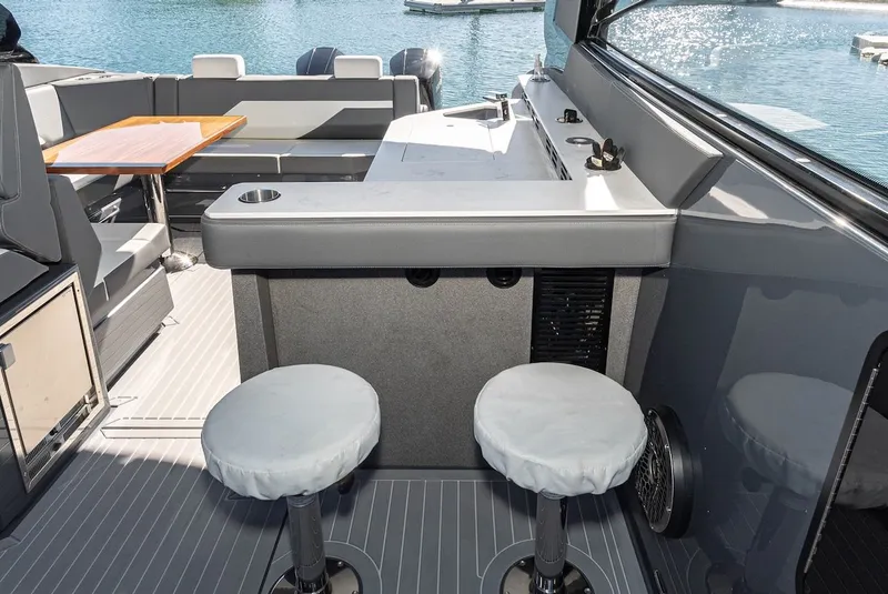 Slide: The Image of Interior of 2023 Cruisers Yachts 42 GLS with bar and seating area. - 25