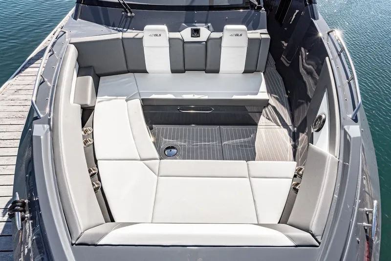 Slide: The Image of Luxurious seating area on the 2023 Cruisers Yachts 42 GLS. - 30