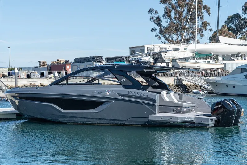 The Image of 2023 Cruisers Yachts 42 GLS docked, sleek design. - 0