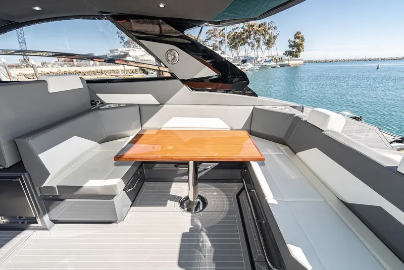 Slide: The Image of Luxurious seating area on the 2023 Cruisers Yachts 42 GLS. - 22