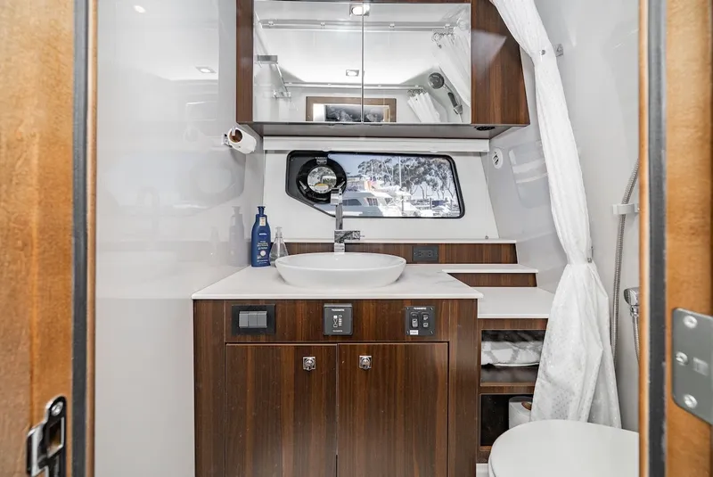 Slide: The Image of Luxurious bathroom in the 2023 Cruisers Yachts 42 GLS. - 38