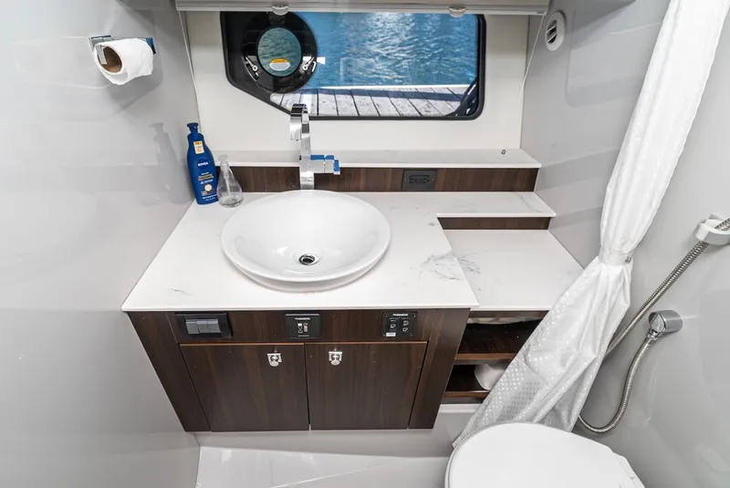 Slide: The Image of Luxurious bathroom on the 2023 Cruisers Yachts 42 GLS model. - 39