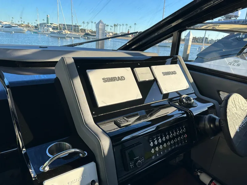 Slide: The Image of Dual Simrad display screens at dash - 68