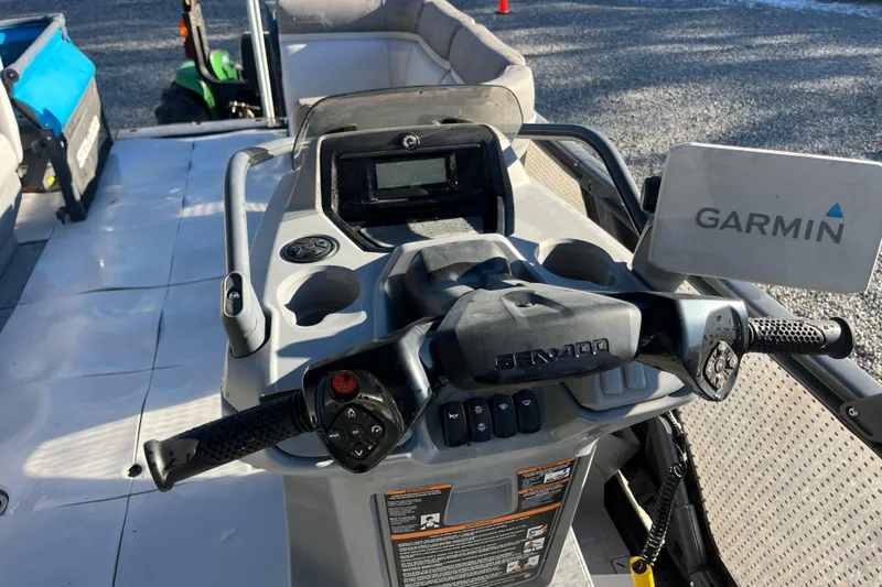 Slide: The Image of 2023 Sea-Doo Switch Cruise 21 dashboard with Garmin navigation system and controls. - 10