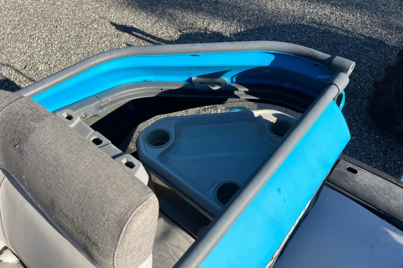 Slide: The Image of 2023 Sea-Doo Switch Cruise 21 interior with blue accents and seating area. - 21