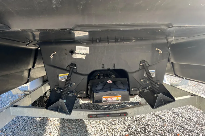 Slide: The Image of 2023 Sea-Doo Switch Cruise 21 underside view, showcasing mechanical components and trailer. - 7