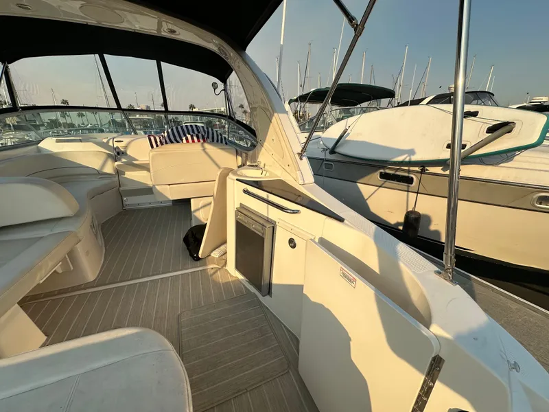 Slide: The Image of Interior of a 2012 Bayliner 335 Cruiser yacht in the marina. - 14