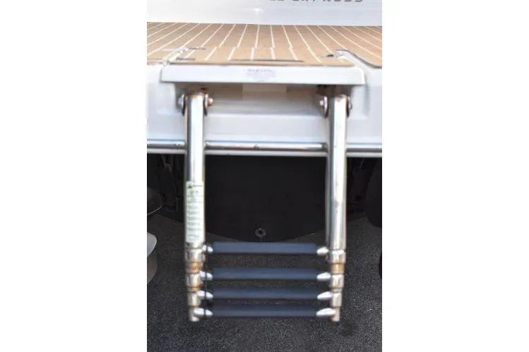 Slide: The Image of Stainless steel swim ladder on 2015 Regal 32 Express boat. - 26