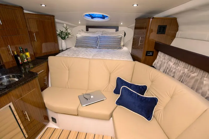 Slide: The Image of 2015 Regal 32 Express boat on trailer, rear view, black cover, Annapolis, Maryland. - 5