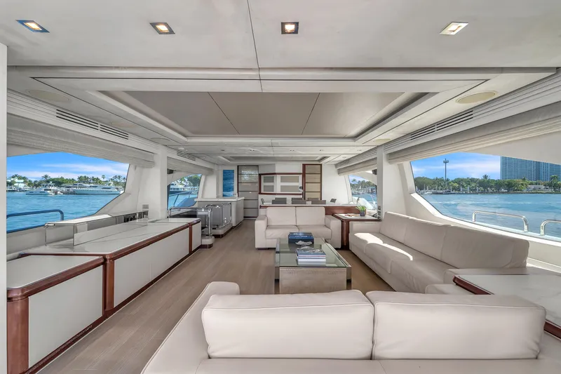 Slide: The Image of Luxurious interior of 2010 Azimut 95 yacht with elegant seating and panoramic windows. - 10