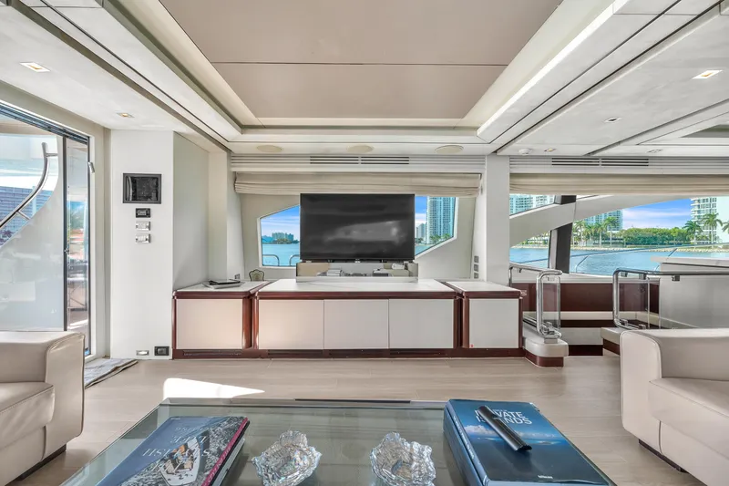 Slide: The Image of Luxurious interior of 2010 Azimut 95 yacht with modern furnishings and waterfront view. - 11