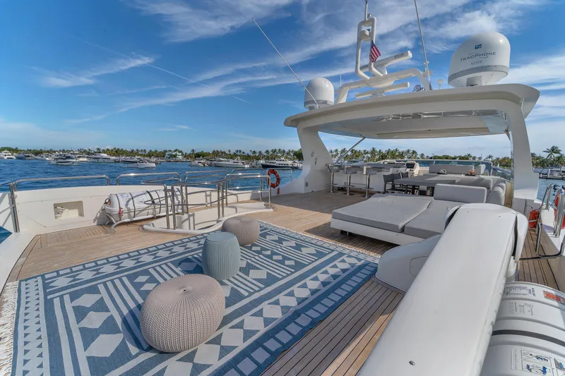 Slide: The Image of Luxurious 2010 Azimut 95 yacht deck with modern seating and ocean view. - 2