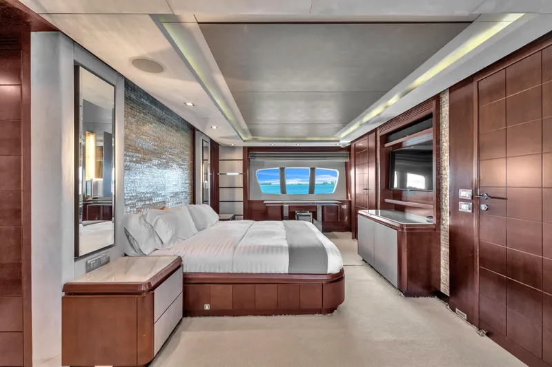 Slide: The Image of Luxurious bedroom interior of 2010 Azimut 95 yacht with ocean view through large windows. - 21