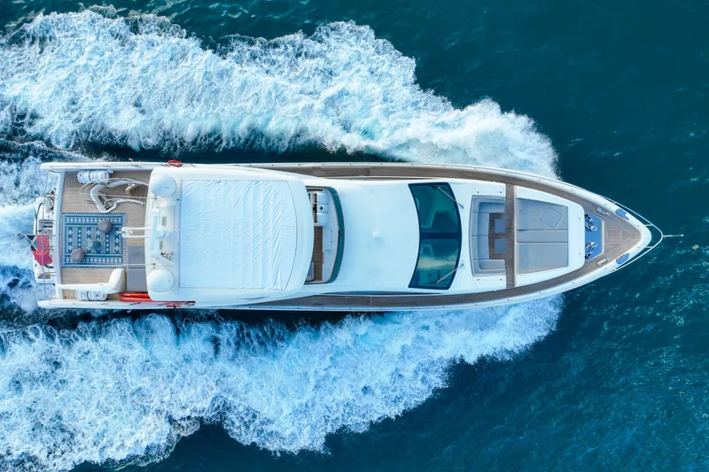 Slide: The Image of Aerial view of 2010 Azimut 95 yacht cruising on blue ocean waters. - 30