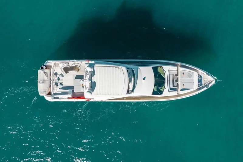 Slide: The Image of Aerial view of 2010 Azimut 95 yacht on turquoise water. - 31