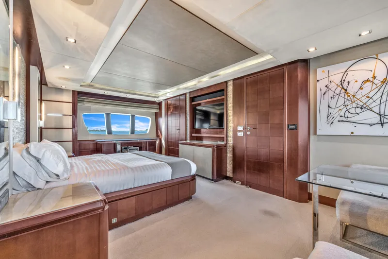 Slide: The Image of Luxurious interior of 2010 Azimut 95 yacht with elegant bedroom and modern decor. - 7