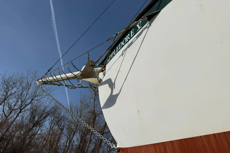 Slide: The Image of Bow of Treworgy 65 Schooner, 1992, with anchor and clear blue sky. - 2