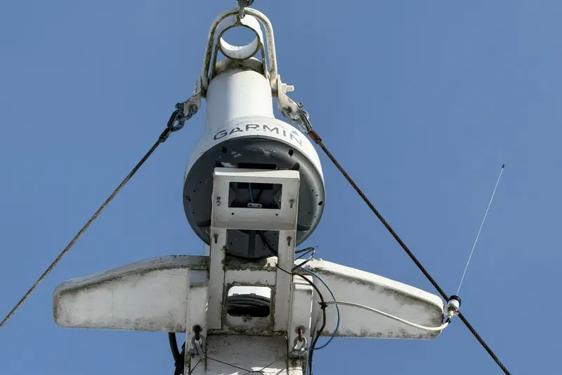 Slide: The Image of Radar equipment on Treworgy 65 Schooner, 1992, against clear blue sky. - 4
