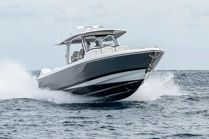 Slide: The Image of 2023 Intrepid 427 Nomad SE boat cruising on open water. - 108