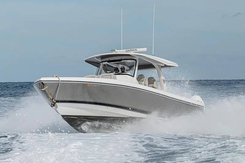 Slide: The Image of 2023 Intrepid 427 Nomad SE boat cruising on open water. - 112